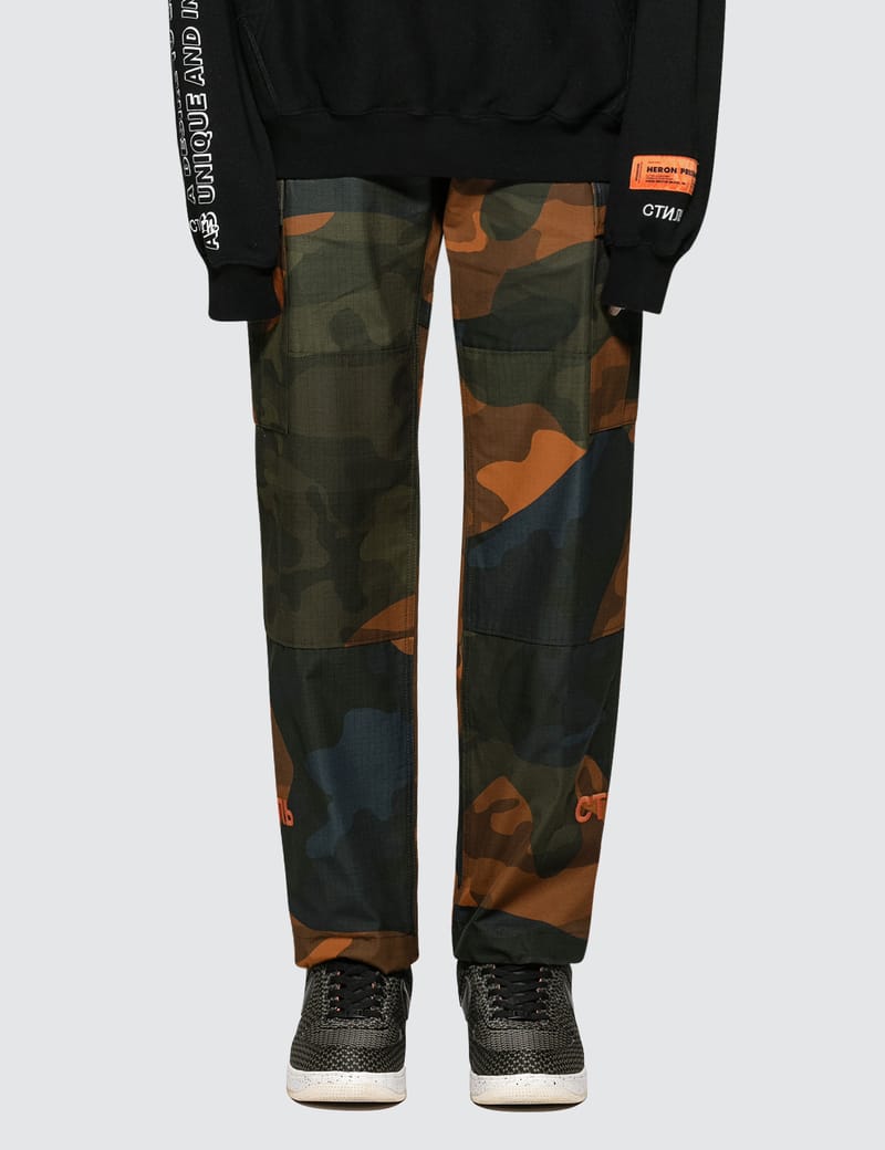 HERON PRESTON® - Ctnmb Orange Camo Cargo Pants | HBX - ハイプ ...