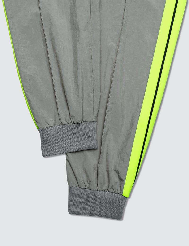 Palm Angels - Loose Fit Track Pants | HBX - Globally Curated