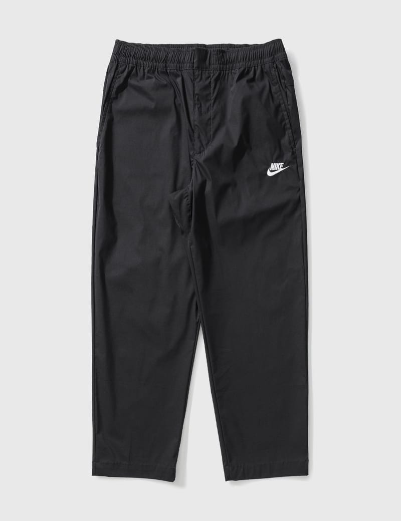 Nike essential woven track pants best sale