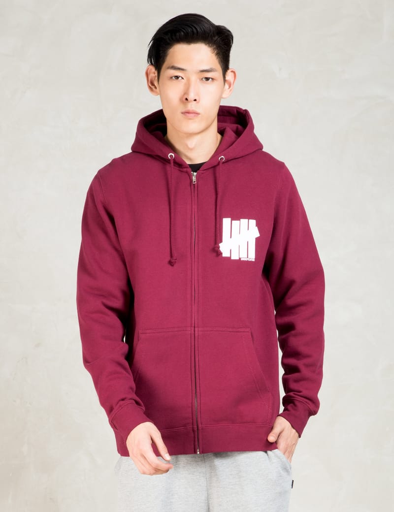 Undefeated - Burgundy Strike Undefeated Zip Hoodie | HBX