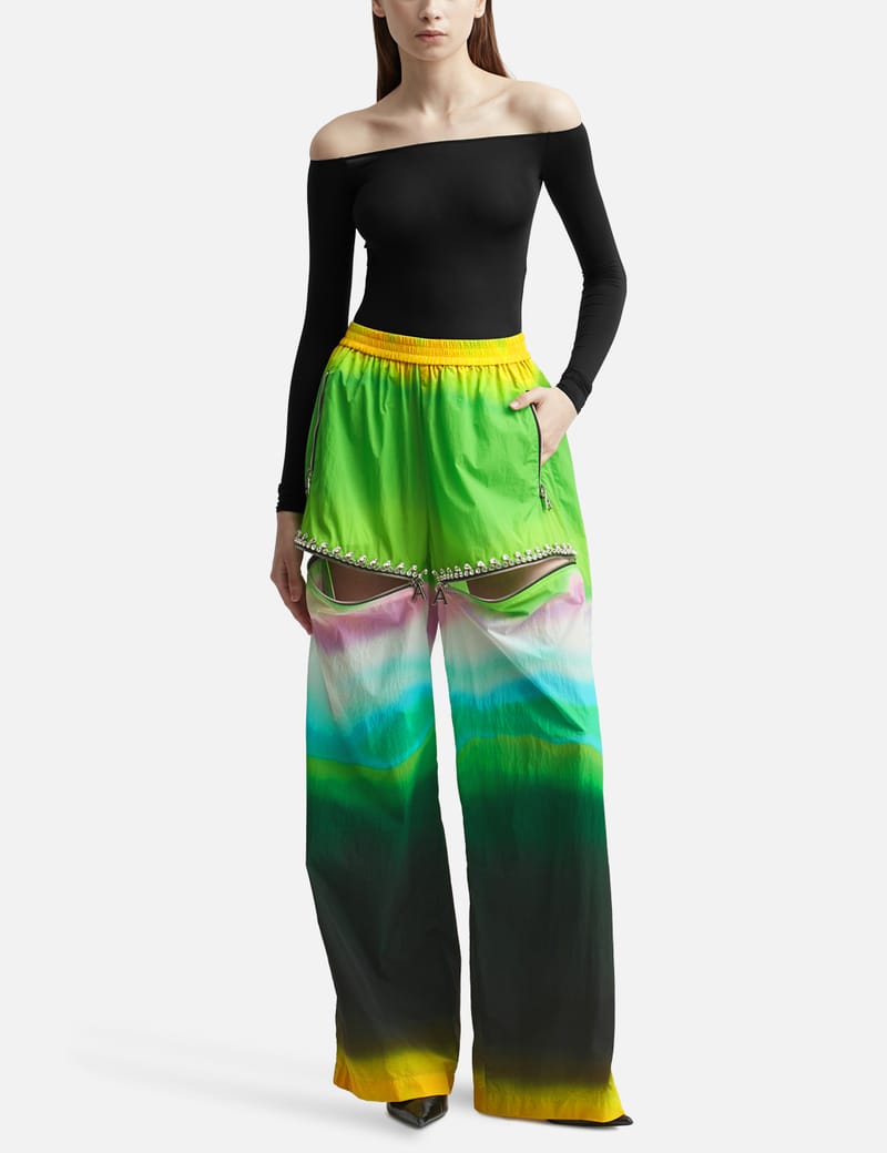 【in a row】Ribbon Slit Nylon Pants Area - Ombre Nylon Crystal Slit Track Pants | HBX - Globally