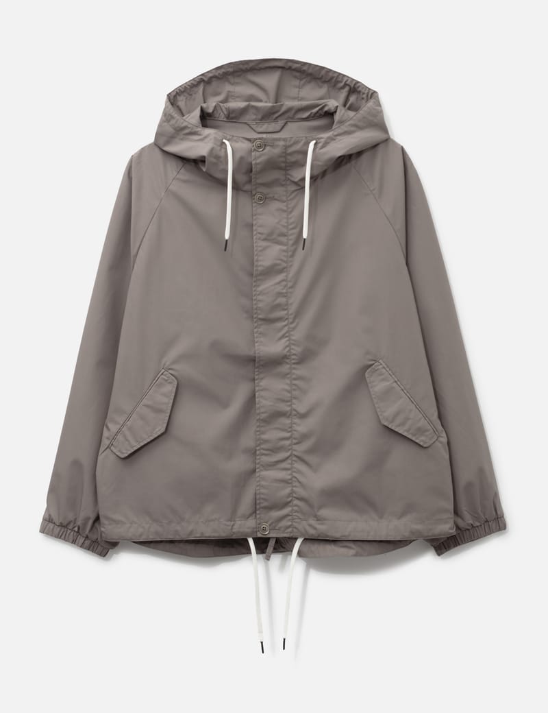Nanamica Hooded Jacket - Roomy beige outerwear with water