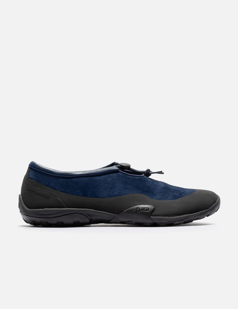 New Balance MT10T - トグルレース＆Vibram®搭載のヌバックスリッポン