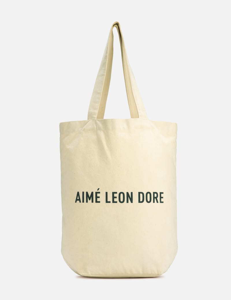 Aimé Leon Dore ロゴトートバッグ　L Aimé Leon Dore Logo Tote - White tote in fair used condition. | HBX