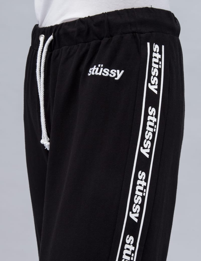 Stüssy - Challenge Track Pants | HBX - Globally Curated