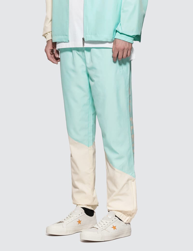 Lacoste - GOLF le FLEUR* x Lacoste Colorblock Trackpants | HBX