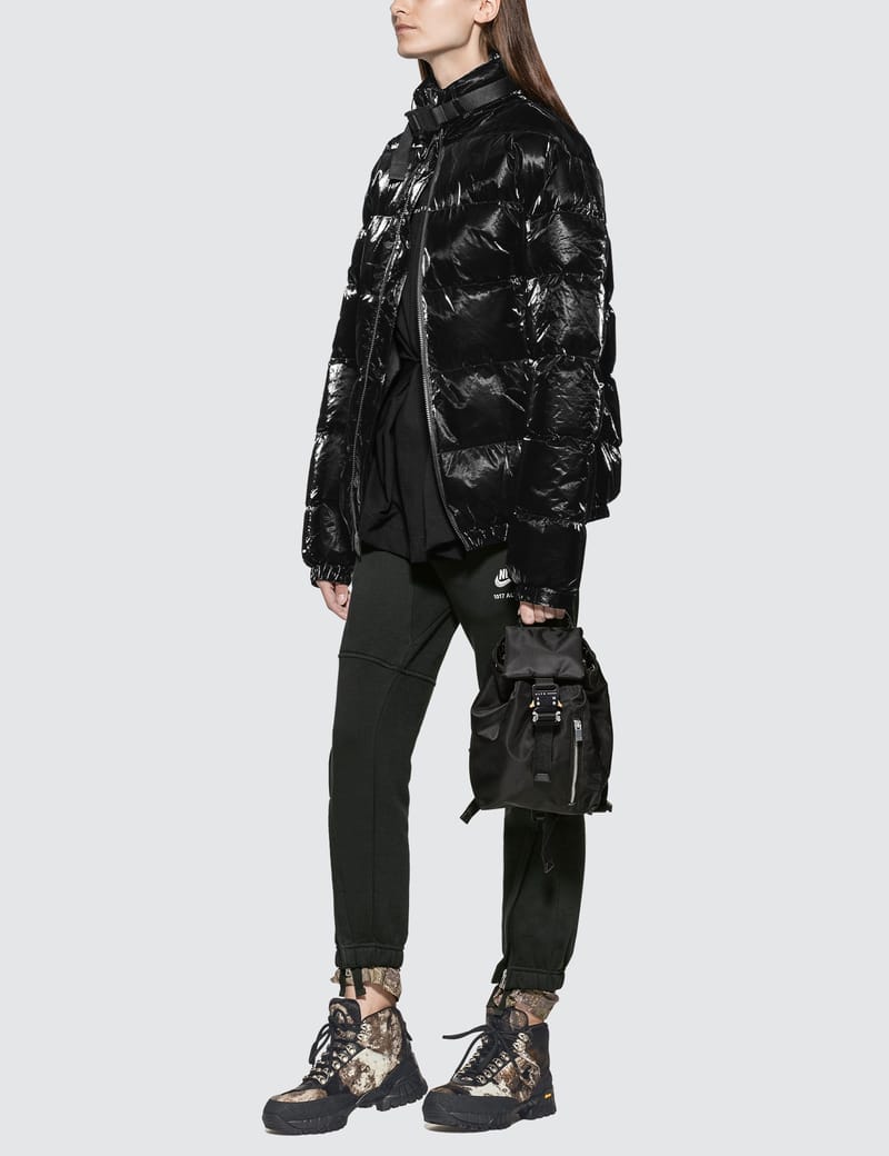 1017 ALYX 9SM - Patent Puffer Jacket With Nylon Buckle | HBX