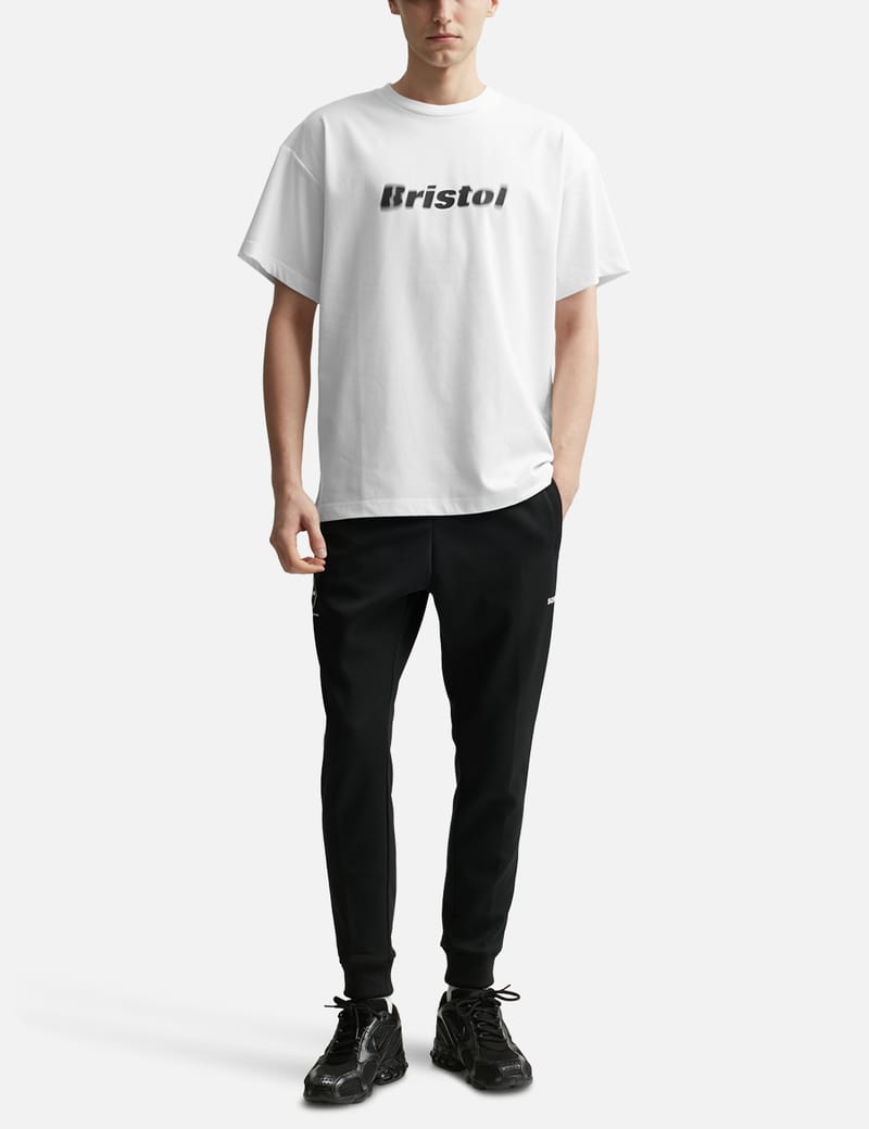 F.C. Real Bristol - BLURRED LOGO T-SHIRT | HBX - HYPEBEAST