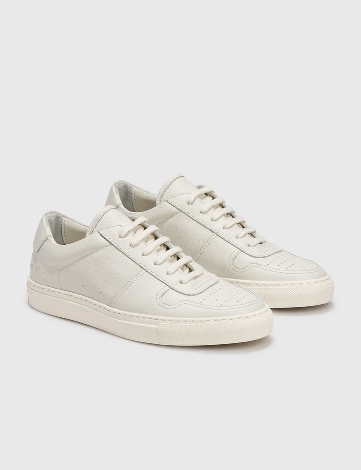 Common Projects - BBALL LOW BUMPY SNEAKERS | HBX - Globally Curated ...