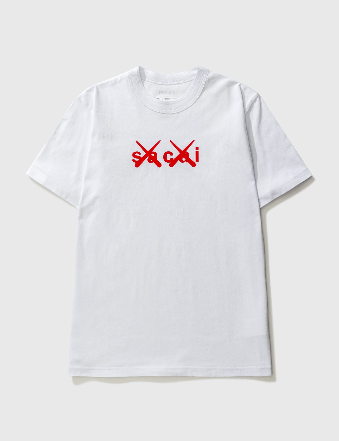 Sacai - KAWS Flock Print T-shirt | HBX - Globally Curated Fashion and  Lifestyle by Hypebeast