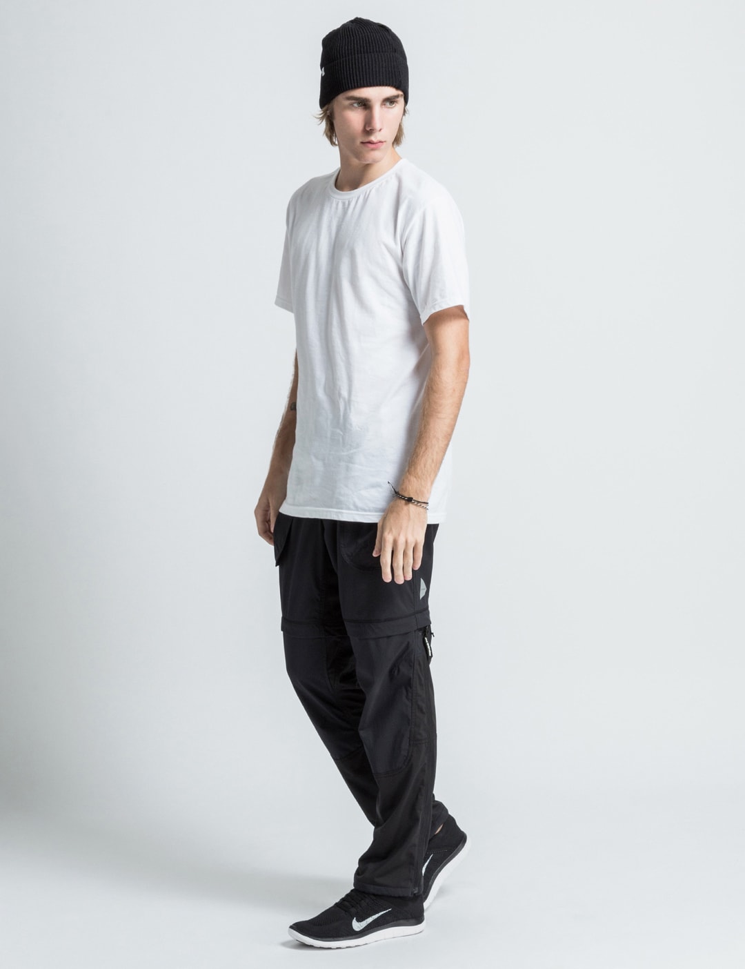 and wander - Black AW-FF724 Pants | HBX - Globally Curated Fashion and ...