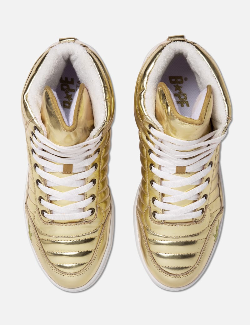 Gold high top outlet sneakers