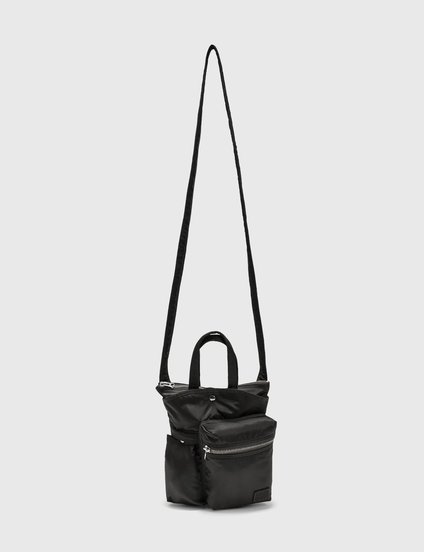 Sacai - Porter Pocket Bag | HBX - HYPEBEAST 為您搜羅全球潮流時尚品牌