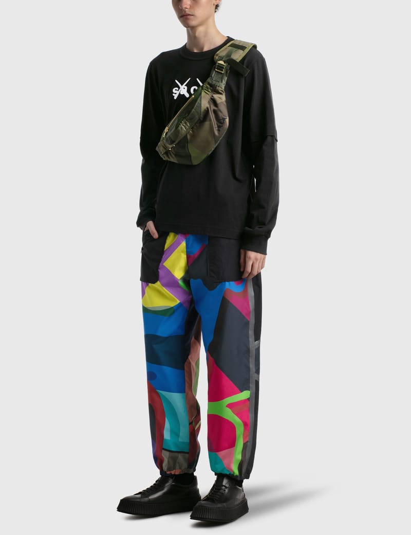 Sacai - KAWS Flock Print Long Sleeve T-shirt | HBX - Globally