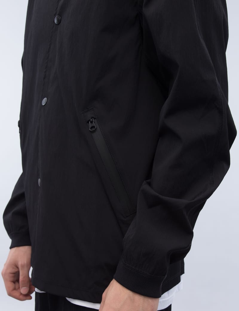 Reigning Champ - Stretch Nylon Coach's Jacket | HBX - Globally