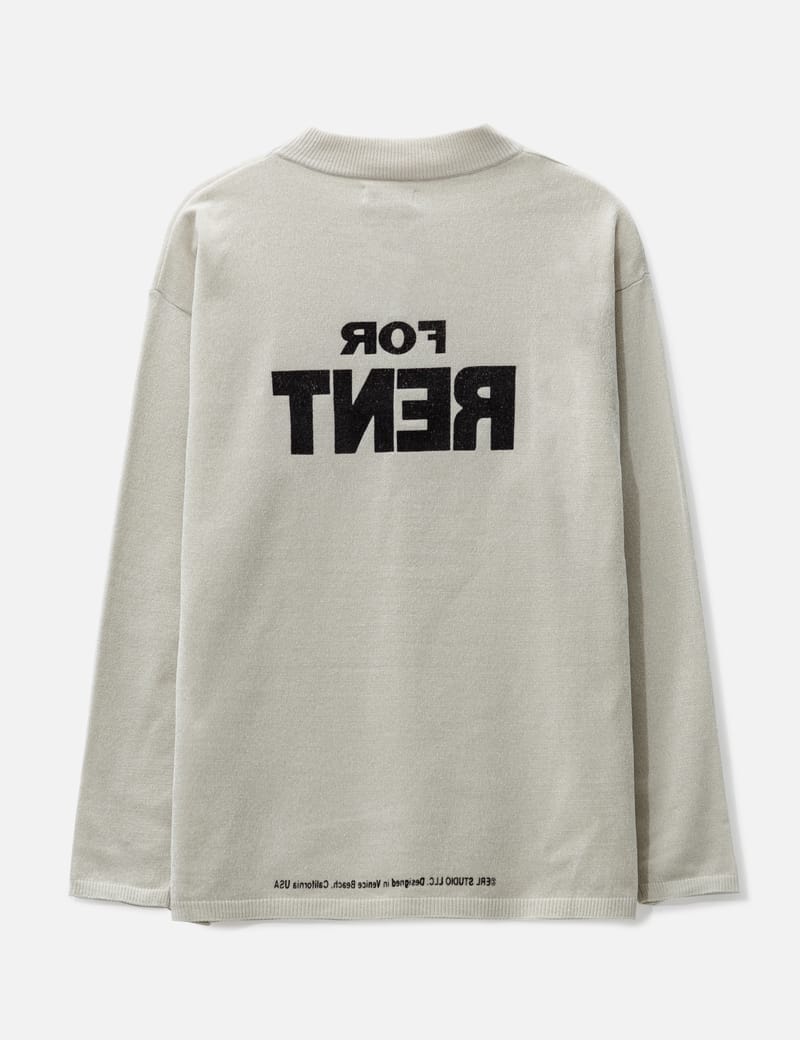 White shop branded jumper