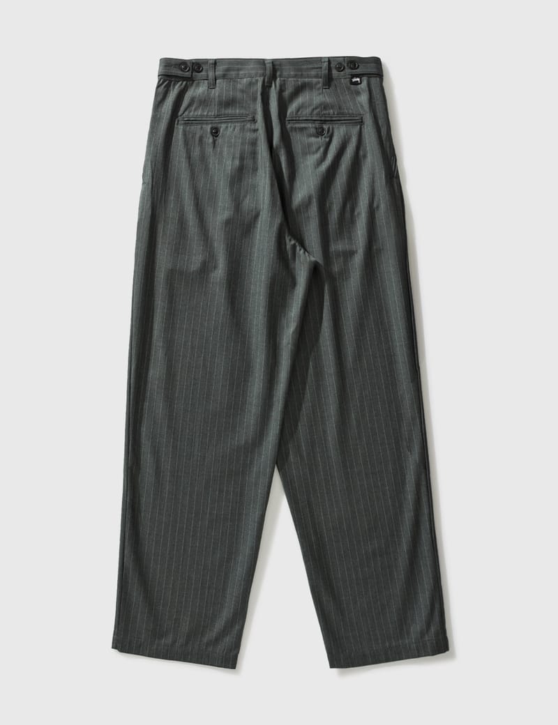 Stüssy - Striped Volume Pleated Trousers | HBX - HYPEBEAST 為您