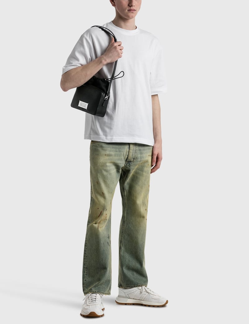 Maison Margiela - Distressed Jeans | HBX - Globally Curated