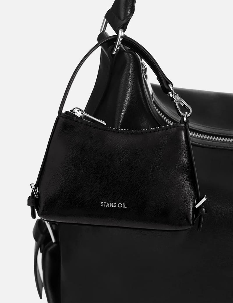STAND OIL Mushy Square Bag - Sleek black faux-leather crossbody