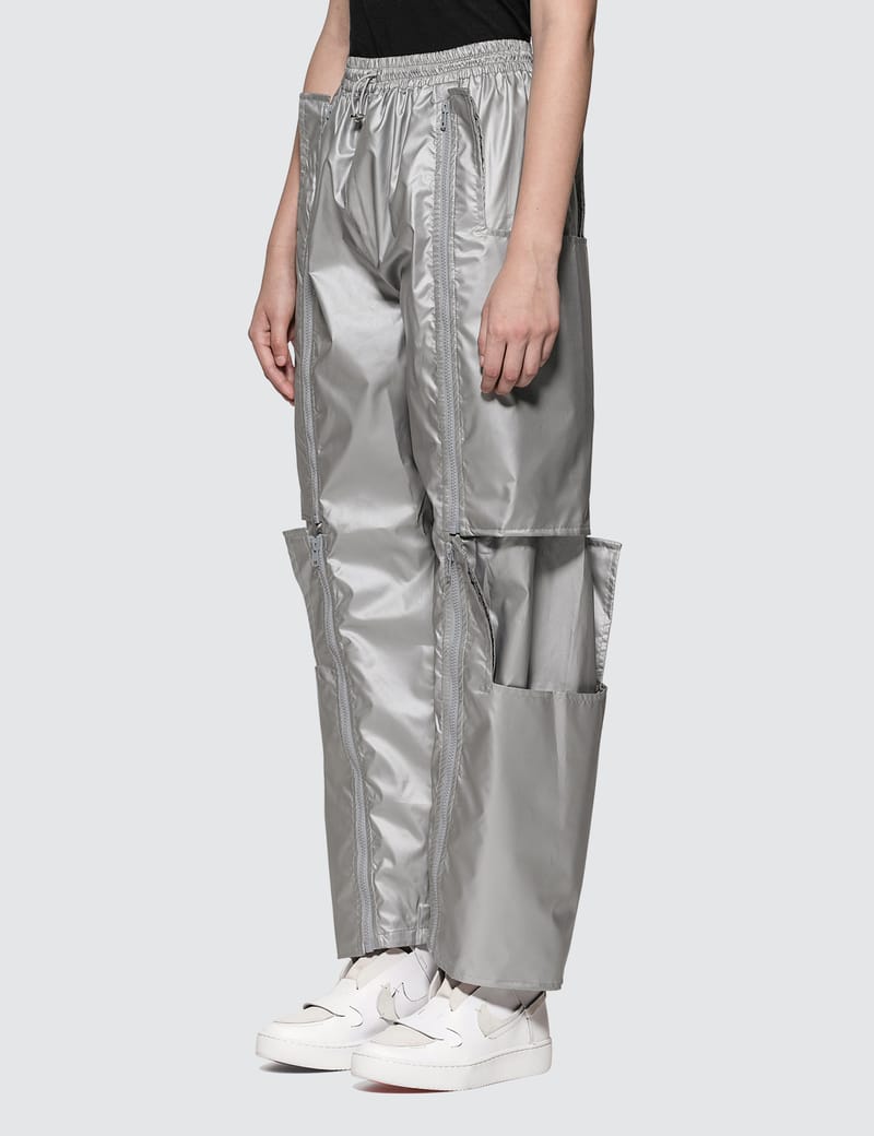 ALCH - Zip Off Reusable Bag Track Pants | HBX - Globally Curated