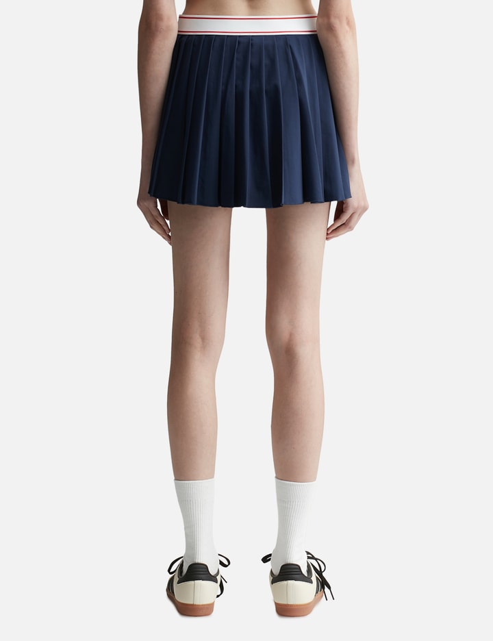 Pleated skirt with logo