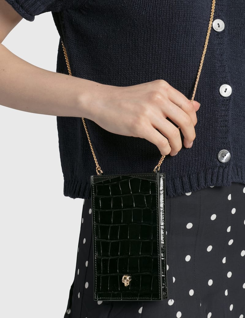 Alexander McQueen チェーン付き スカル フォンケース Alexander McQueen - チェーン付き スカル フォンケース | HBX