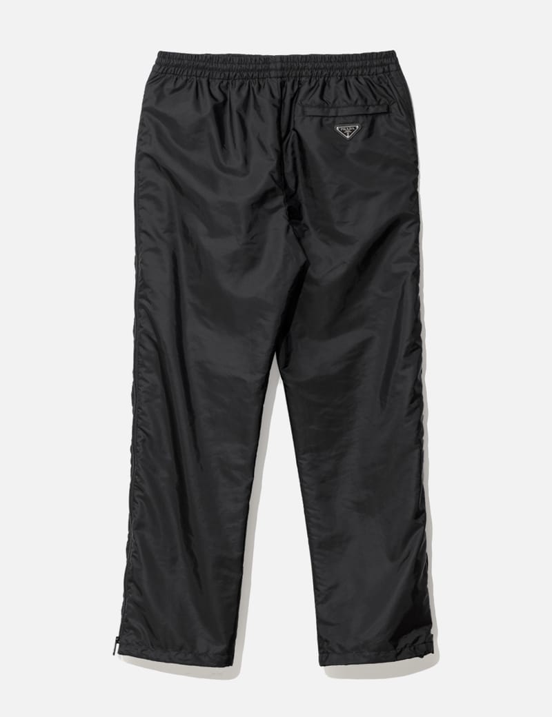 Prada - RE-NYLON SIDE ZIP PANTS | HBX - Globally Curated Fashion 