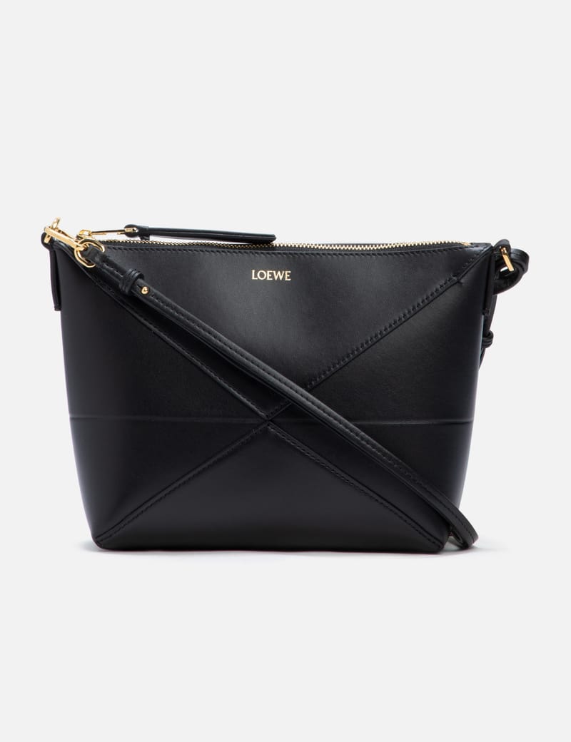バッグ・カバンその他 Loewe Pochette Puzzle Fold In Pelle Puzzle Fold leather clutch in black - Loewe | Mytheresa
