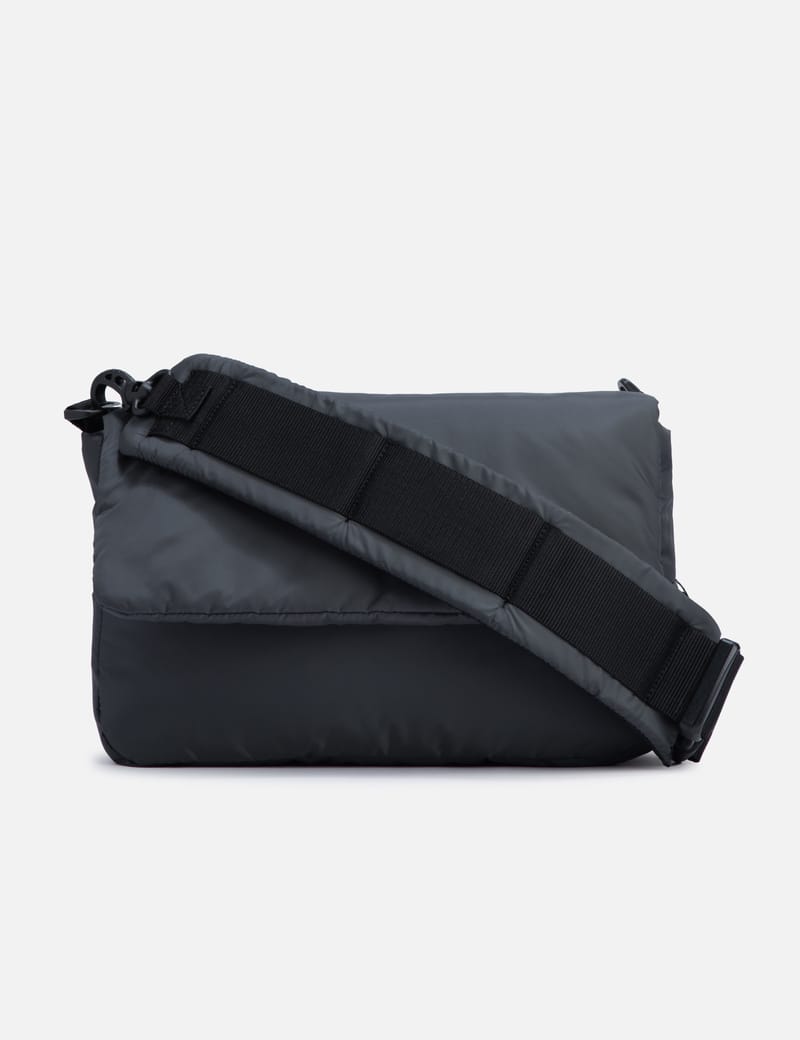 CLESSTE - PADDED FLAP HOLIDAY BAG | HBX - ハイプビースト