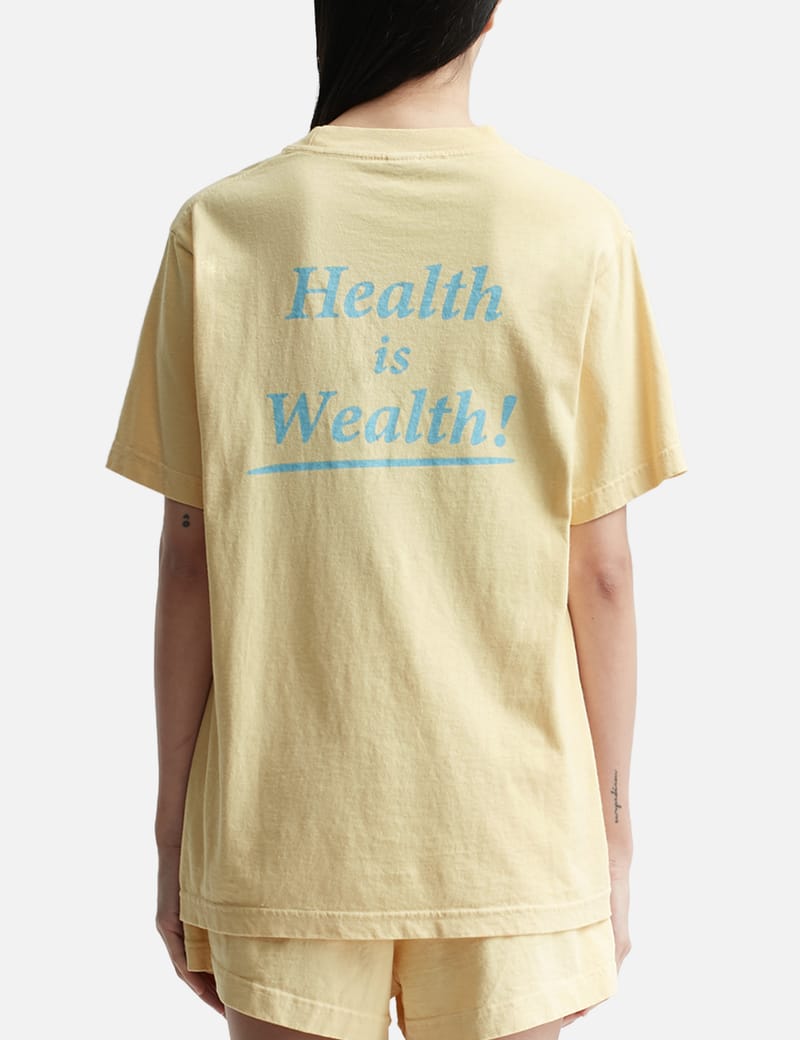 Sporty & Rich - Health Is Wealth Tシャツ | HBX - ハイプビースト ...