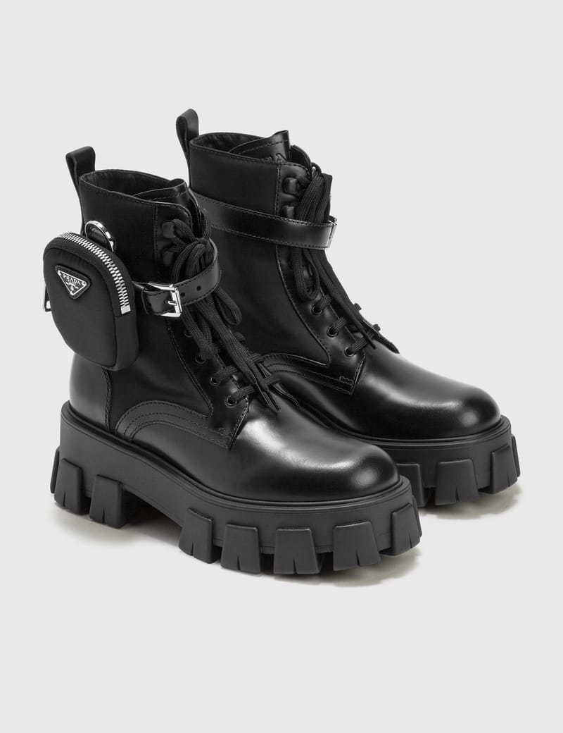【PRADA】BRUSHED LEATHER COMBAT BOOTS Logo brushed leather combat boots in black - Prada | Mytheresa