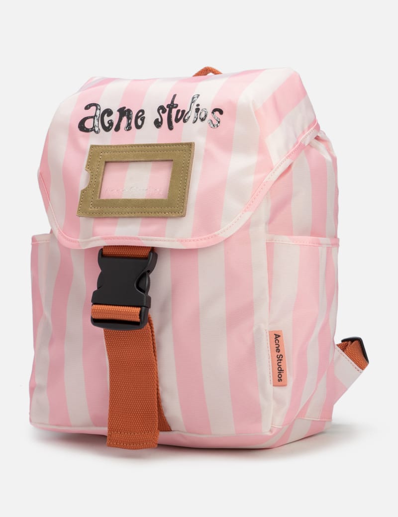 Acne Studios リュック ピンク/ベージュ Acne Studios Mini Monogram Backpack in Beige & Pink | FWRD