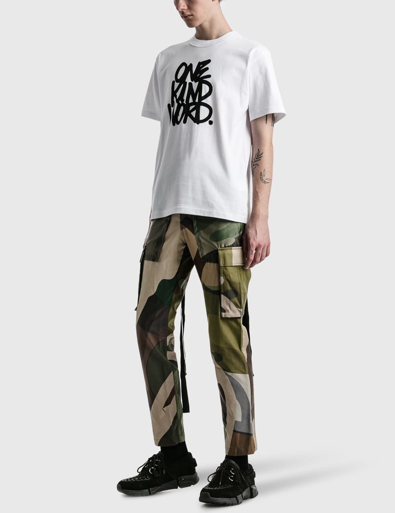 Sacai - Eric Haze Tシャツ | HBX
