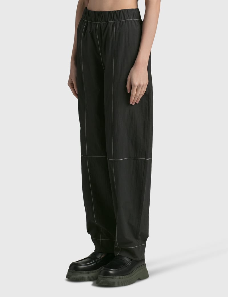 Ganni - Elasticated Curve Pants | HBX - Globally Curated