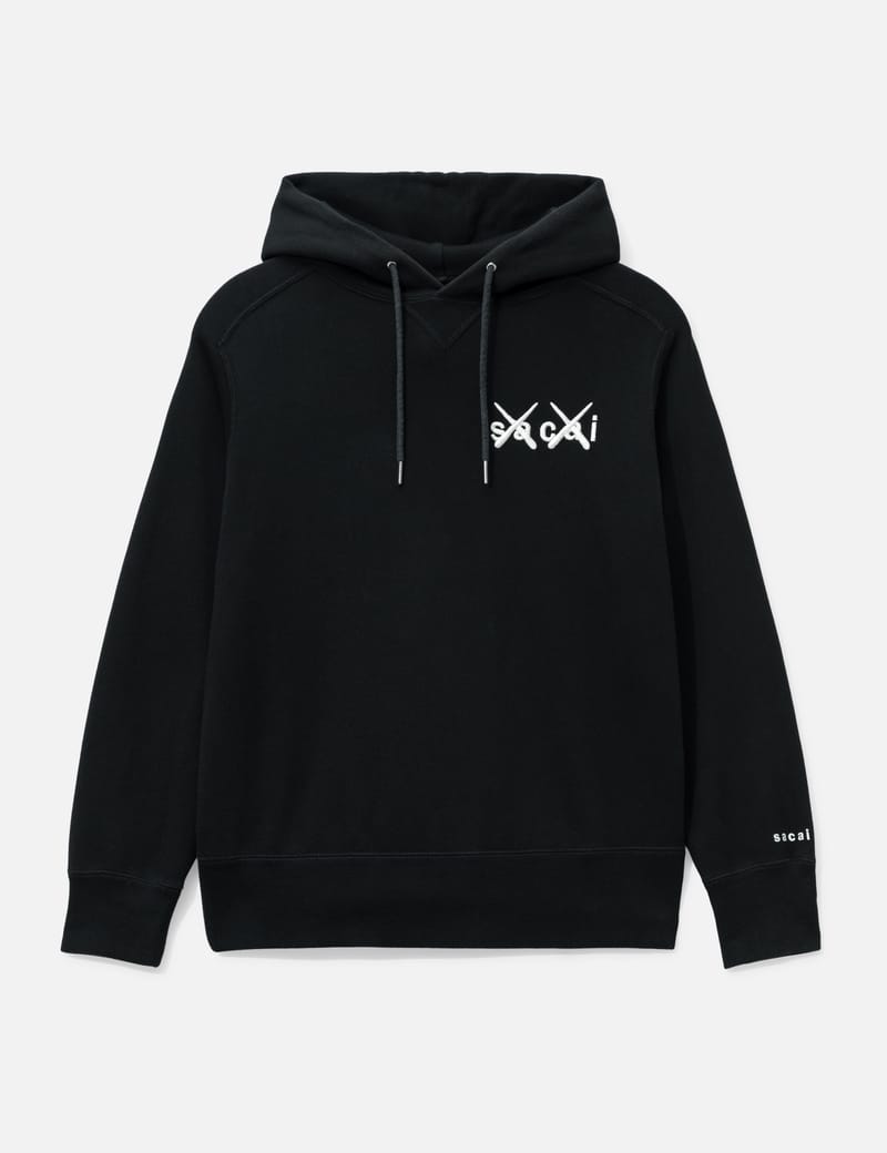 Sacai Kaws Hoodie - Black cotton hoodie in excellent condition | HBX