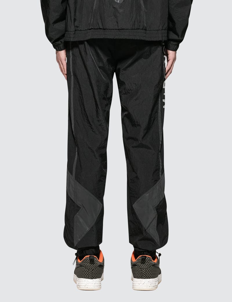 M+RC Noir - OG Reflective Track Pant | HBX - HYPEBEAST 為您搜羅