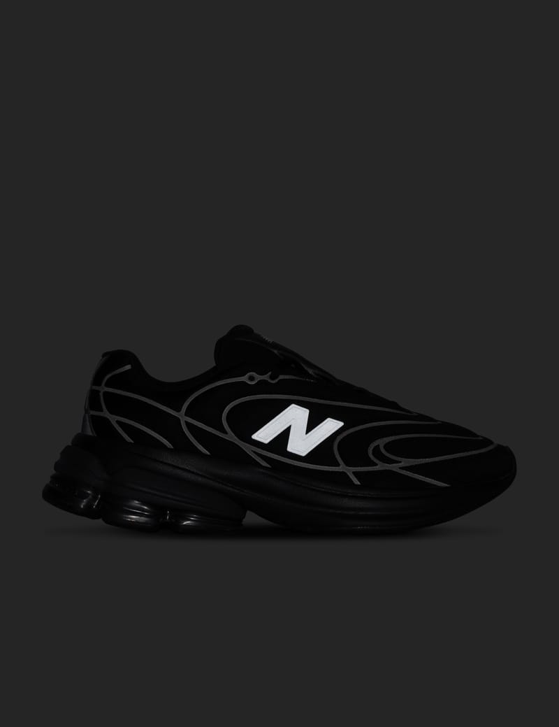 New Balance 5030 - Sleek black sneakers with ABZORB cushioning and