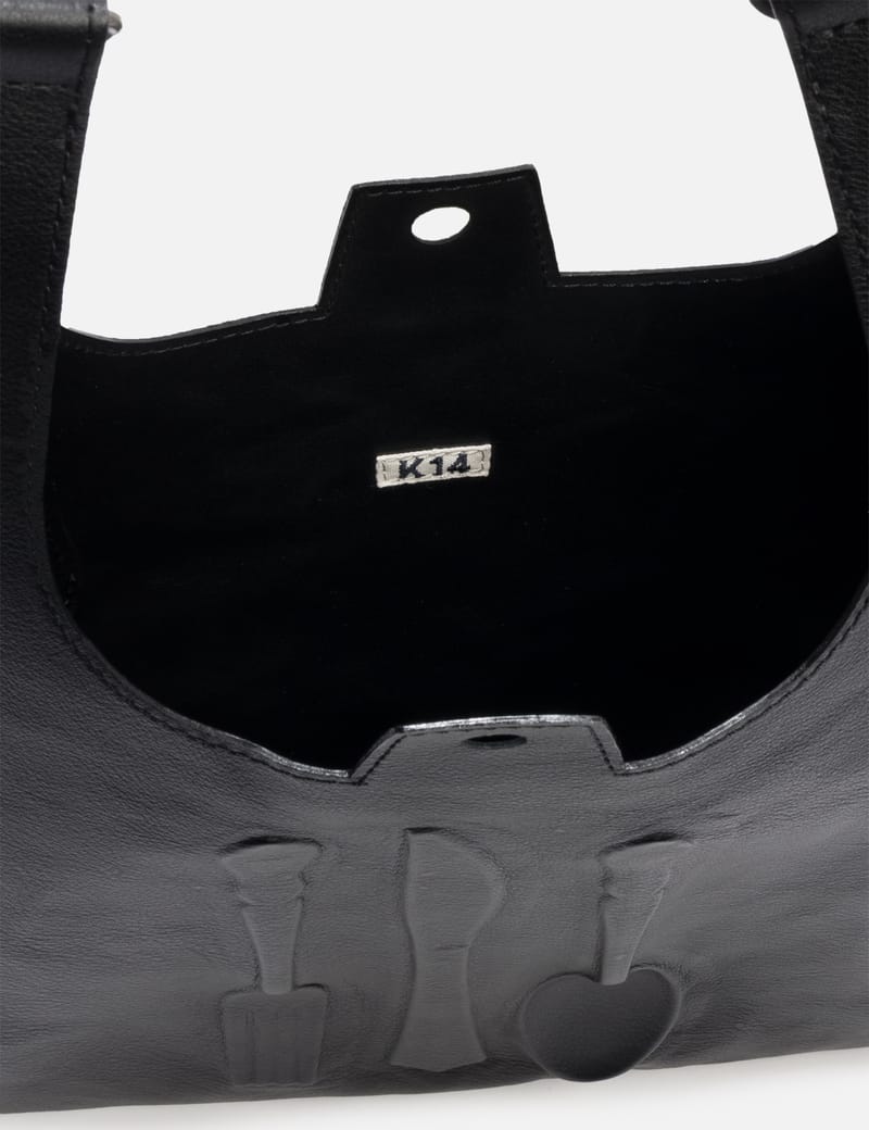 KHOKI ショルダーバッグ KHOKI The Object Bag - 本革製、カトラリー装飾が魅力のユニークな