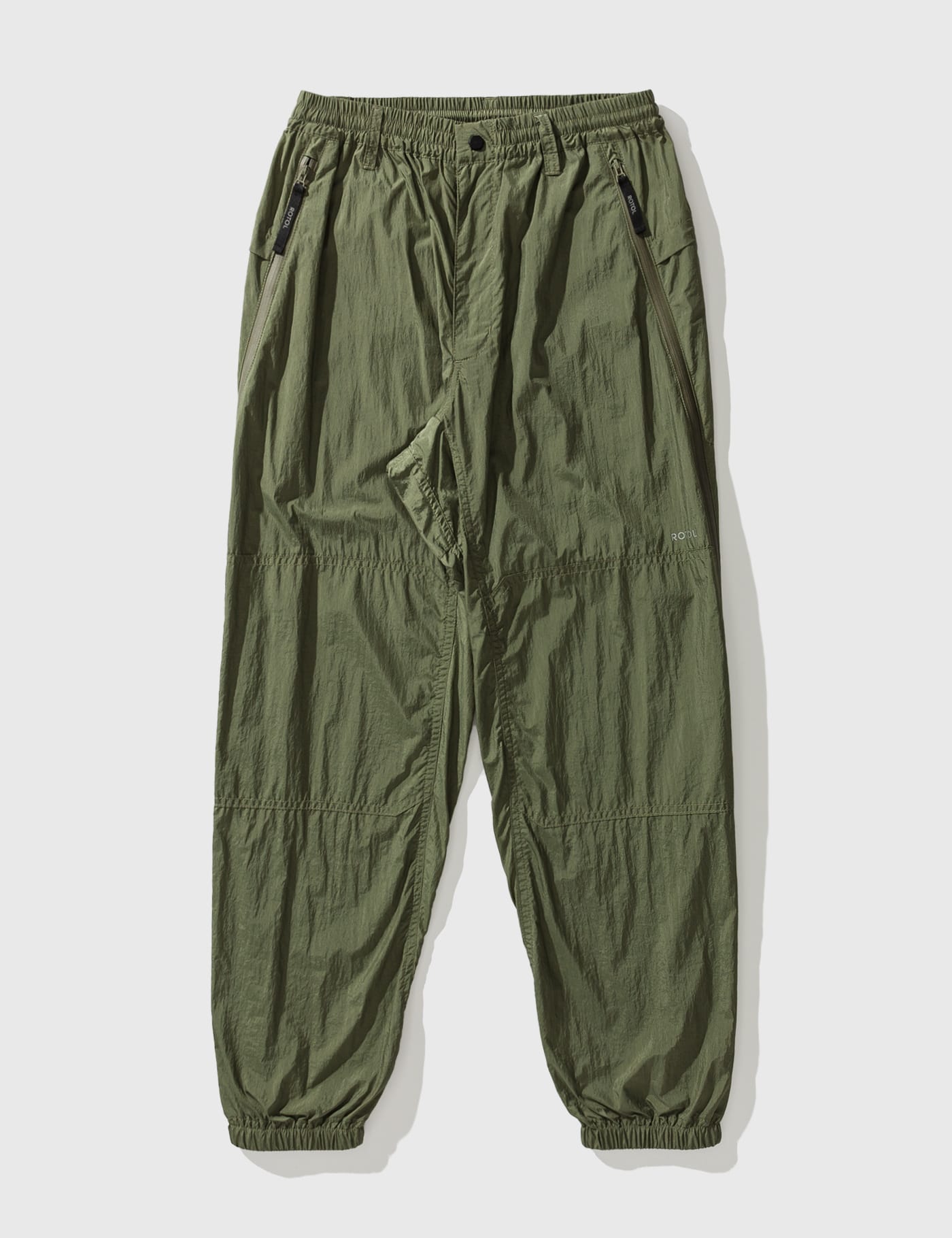 Rotol - Twist Track Pants | HBX - Globally Curated Fashion and