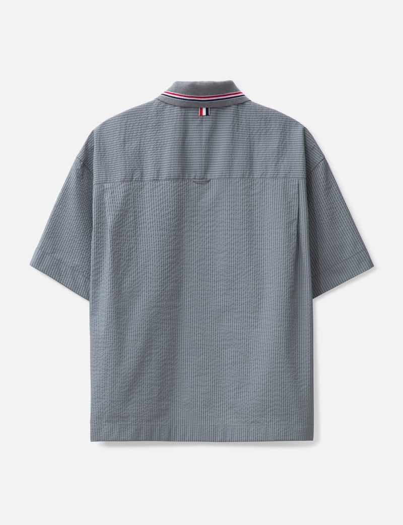 Thom Browne - Step Hem Short Sleeve Rugby Shirt | HBX