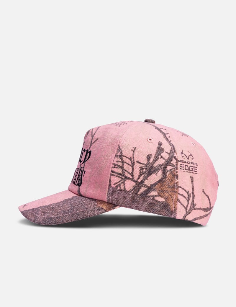 ジューシークチュール プレジャーズ キャップ Pleasures - Pleasures x Juicy Couture Realtree Cap | HBX