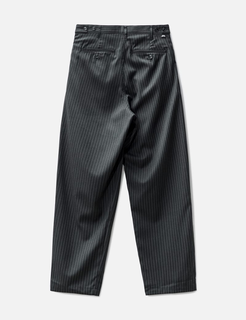 Stüssy - Stripe Volume Pleated Trousers | HBX - HYPEBEAST 為您搜羅