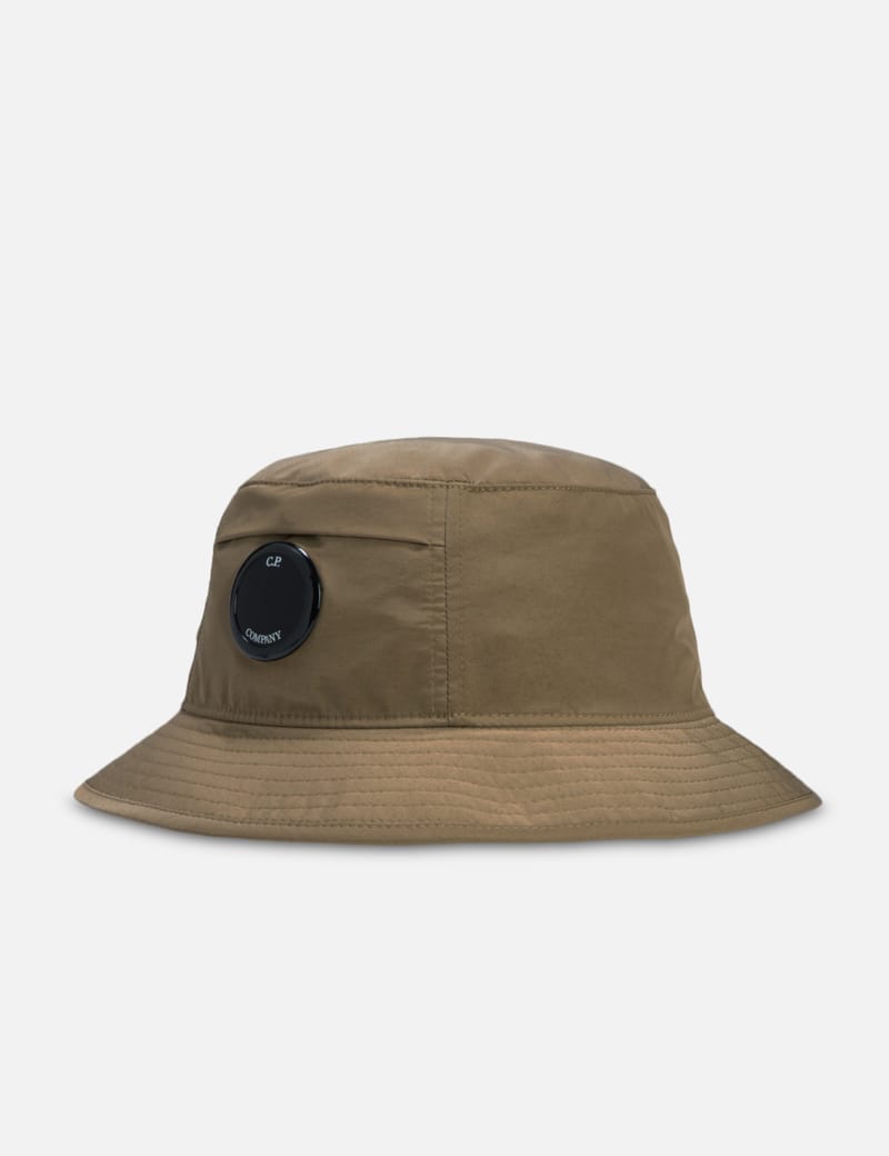 C.P. Company - Chrome-R Lens Bucket Hat | HBX - Globally Curated