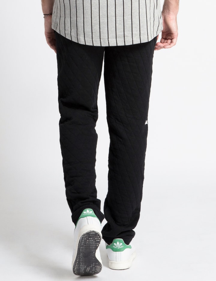 ALIFE Black Diamond Quilt Sweatpants HBX Globally Curated Fashion and Lifestyle by Hypebeast