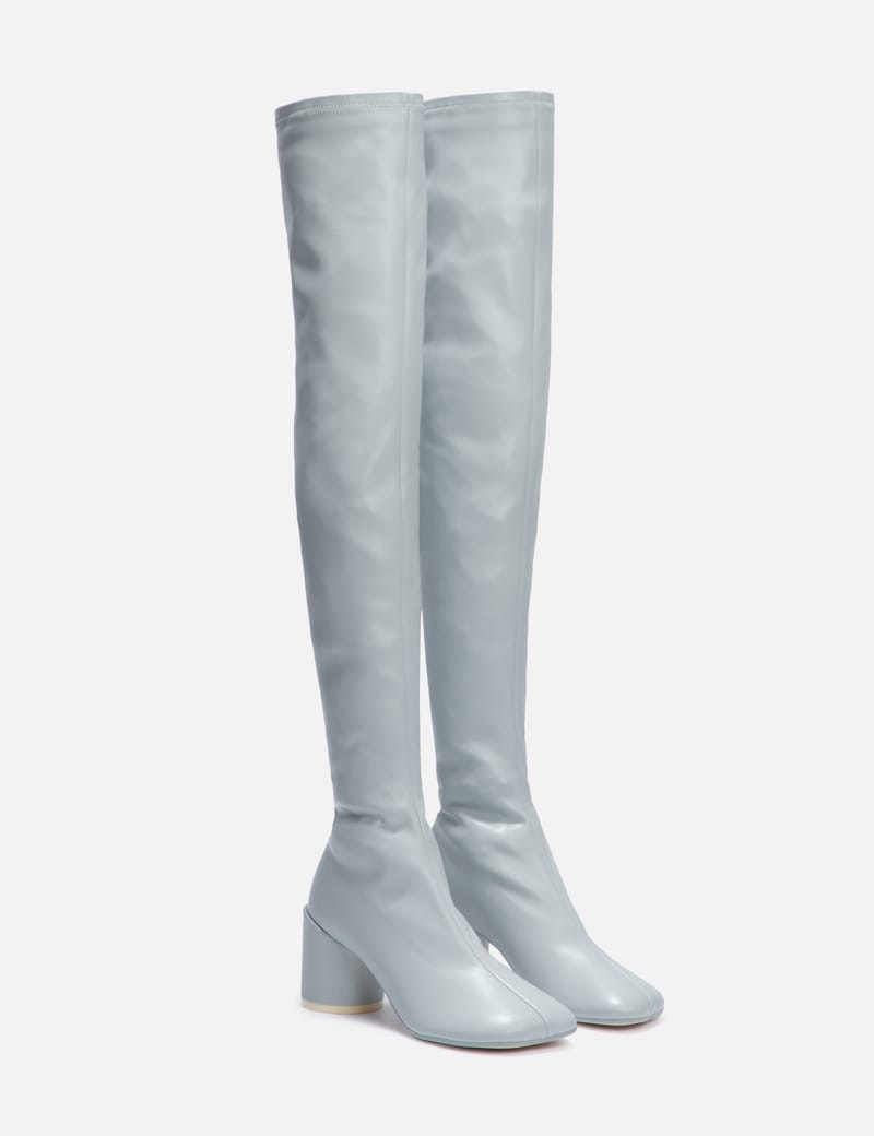 Thigh high clearance boots in store