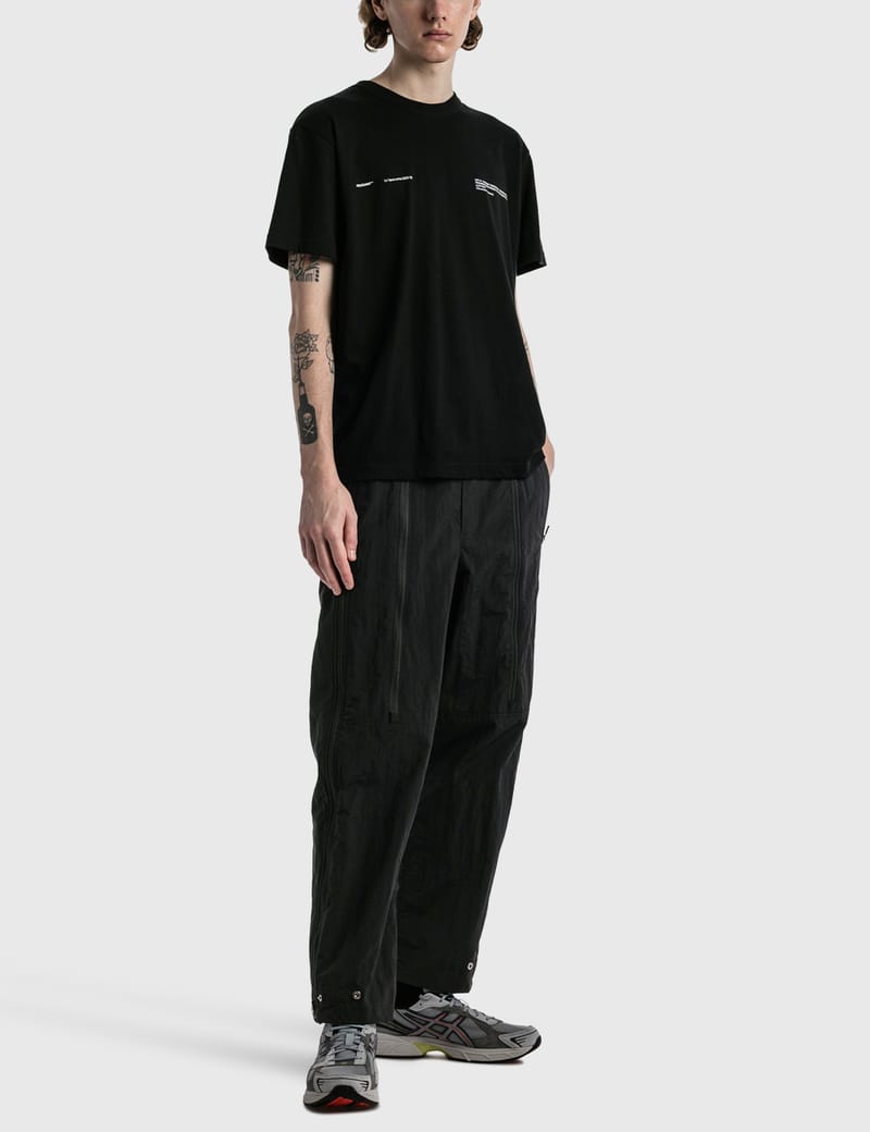 POLIQUANT - THE DEFORMED PARACHUTE PANTS | HBX - Globally Curated